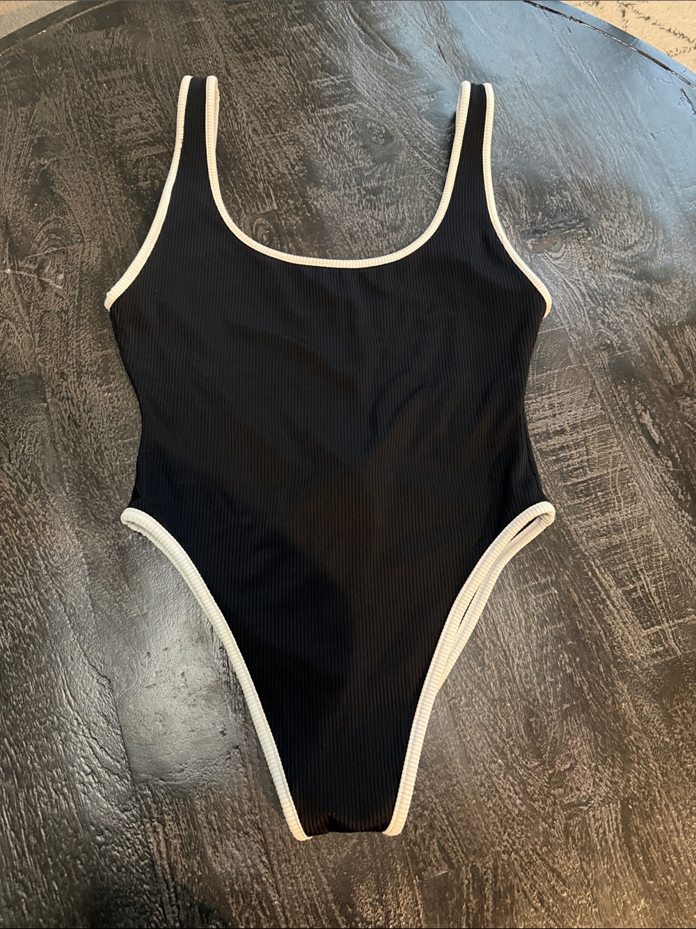 Rumored Black One-Piece Swimsuit with White Trim
